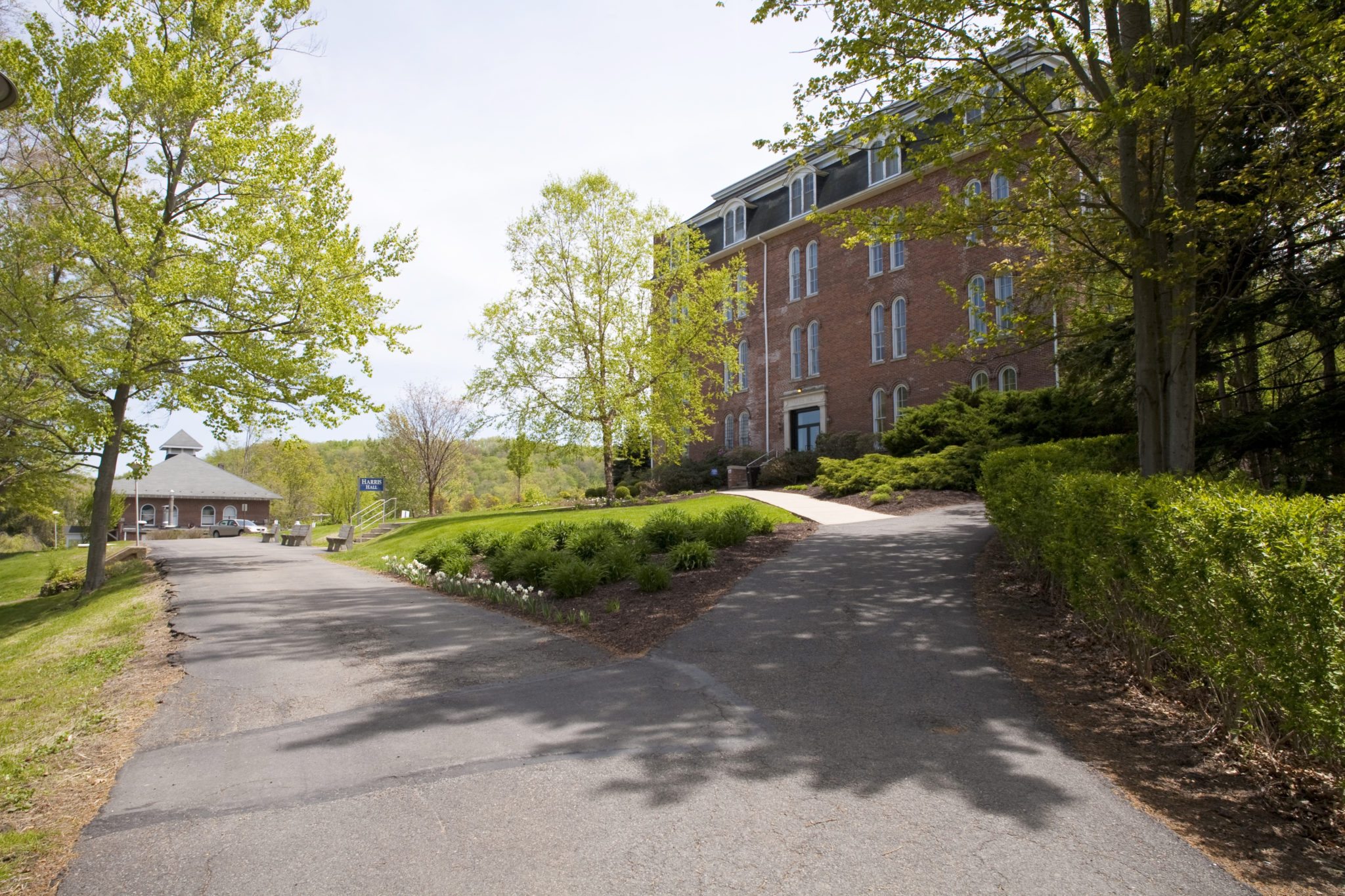 Two walk ways lead too two brick buildings on Keystone College campus
