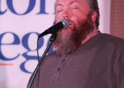 Man singing at microphone