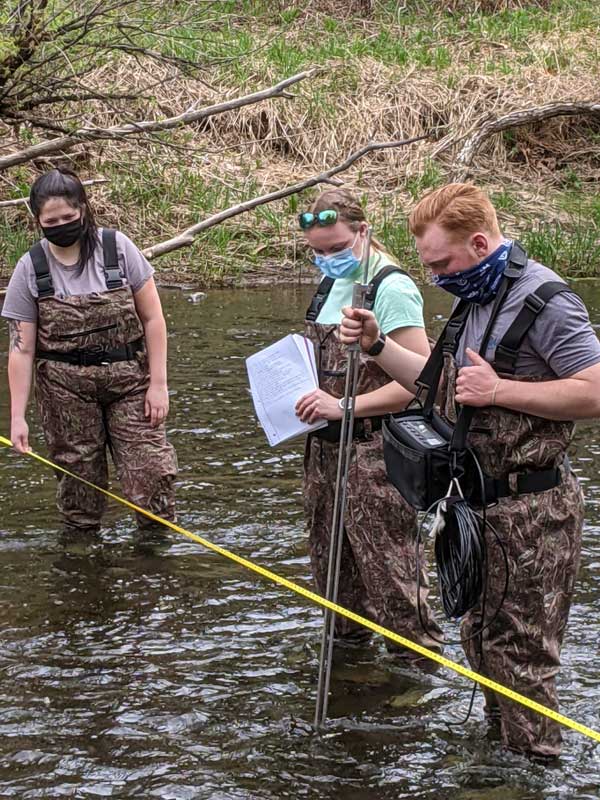 Environmental Science students in creek