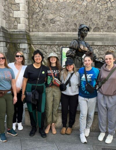 Students in front of Molly Malone Statue on Grafton Street in Dublin